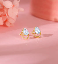 Gold Solitaire Teardrop Studs