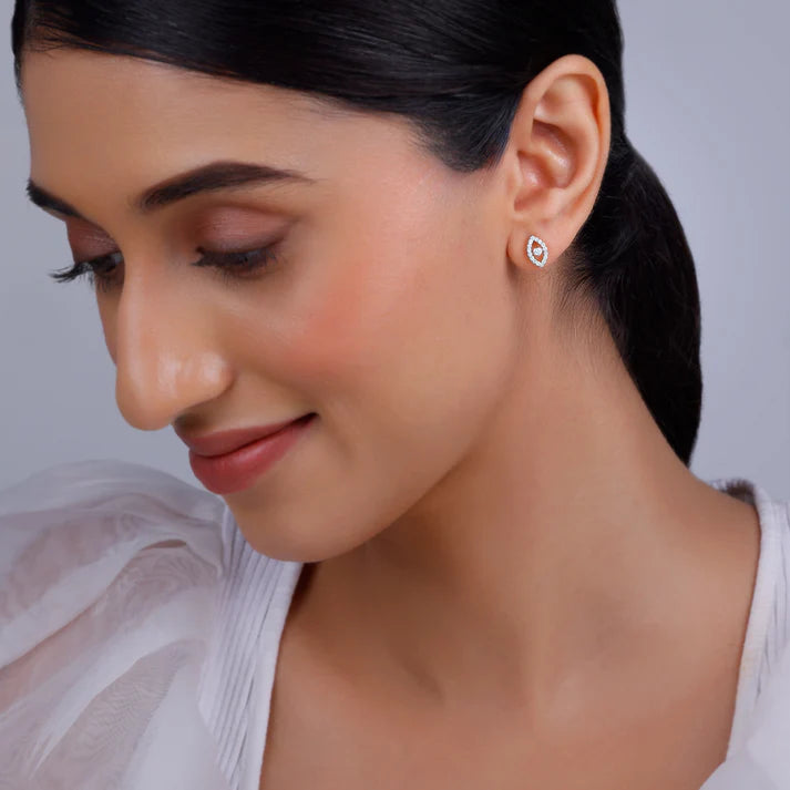 gold mystic eyes diamond stud earrings