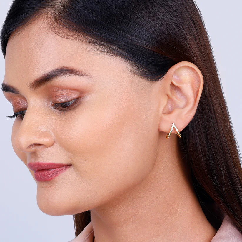gold v stud diamond earrings