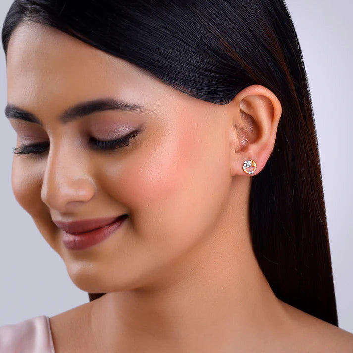 gold unfurl diamond earrings