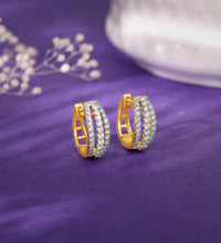 Gold Twirl in Style Diamond Hoops