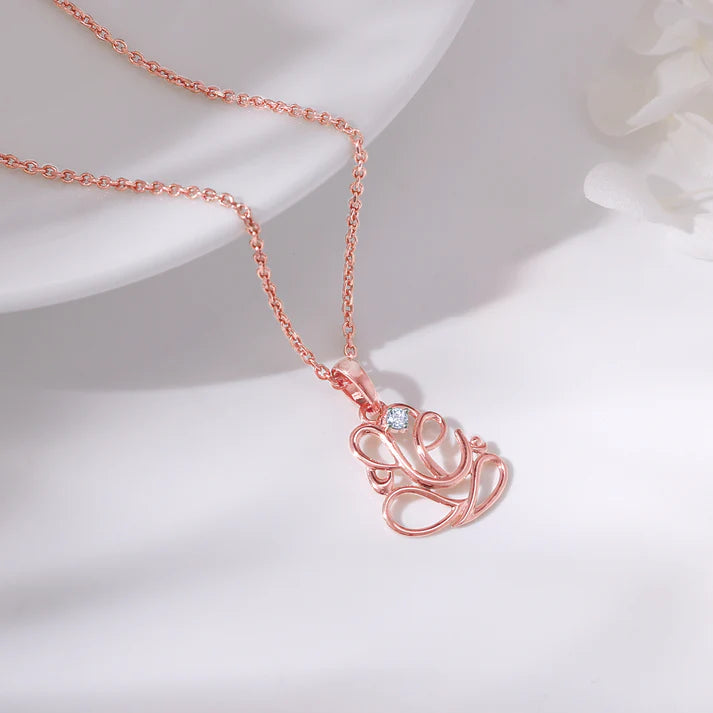 rose gold ganesha diamond pendant