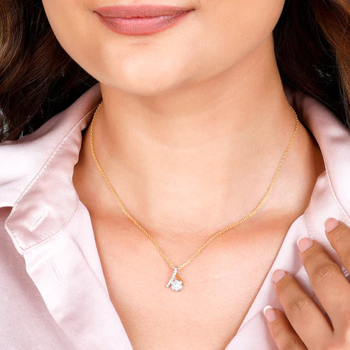 gold tantalising twist diamond pendant